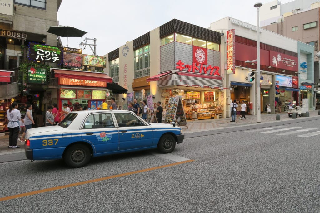 Taxi in Kokusai Dori Shopping Street Naha Okinawa Japan