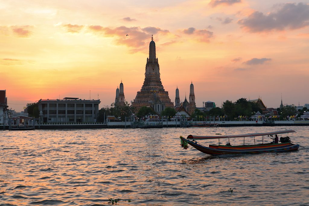 Wat Arun temple on the shores of the Chao Praya River - Bangkok